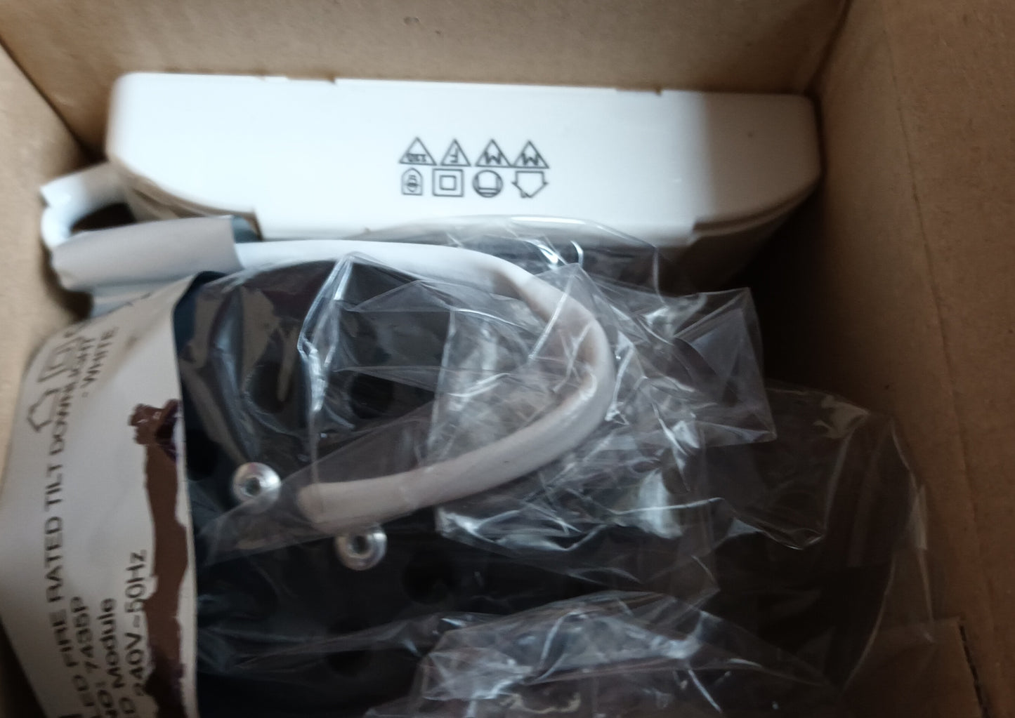 Tilt 9w LED Downlight matt white IP20, 3000K, 560lm fire rated.