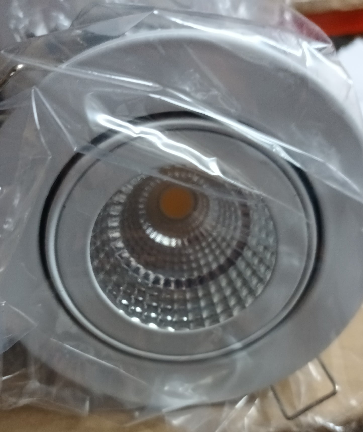 Tilt 9w LED Downlight matt white IP20, 3000K, 560lm fire rated.